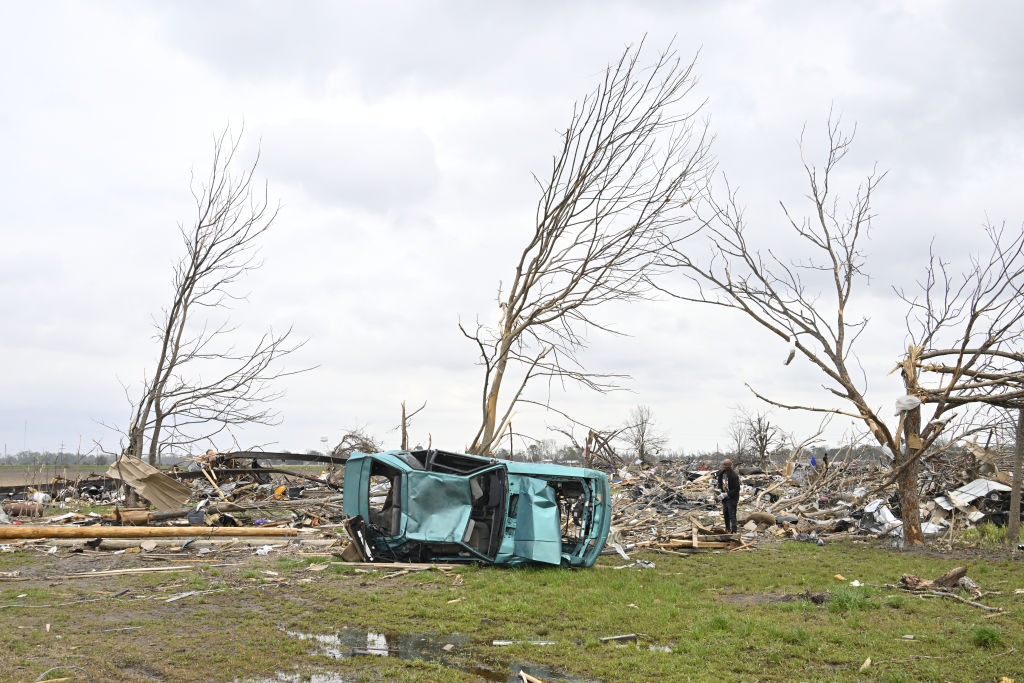 Residents cleaning up after devastating tornadoes hit Rolling Fork, MS, United States in March 2023.