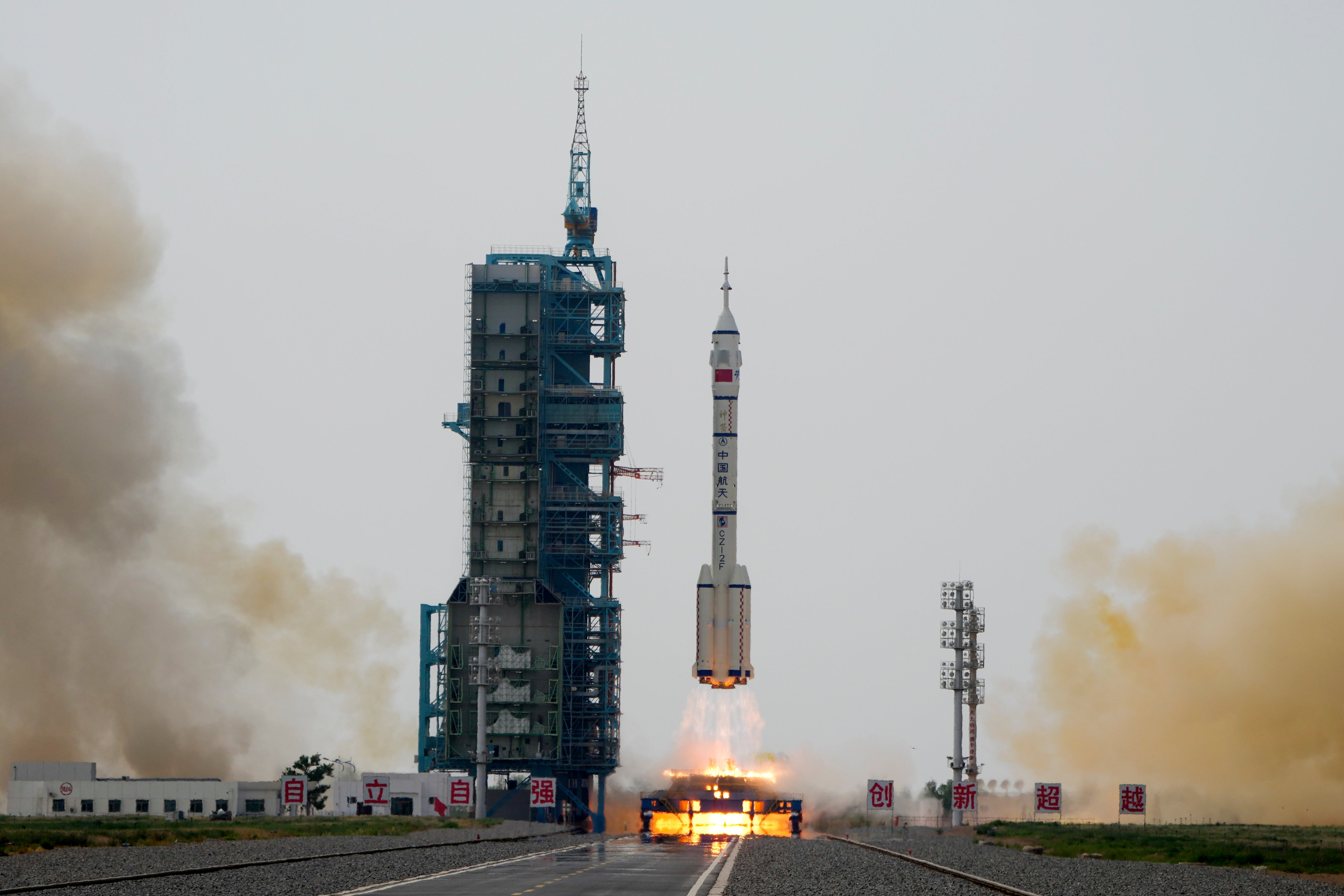 A Long March rocket carrying a crew of Chinese astronauts in a Shenzhou-16 spaceship lifts off at the Jiuquan Satellite Launch Center in northwestern China, Tuesday, May 30, 2023. (Mark Schiefelbein—AP Photo)