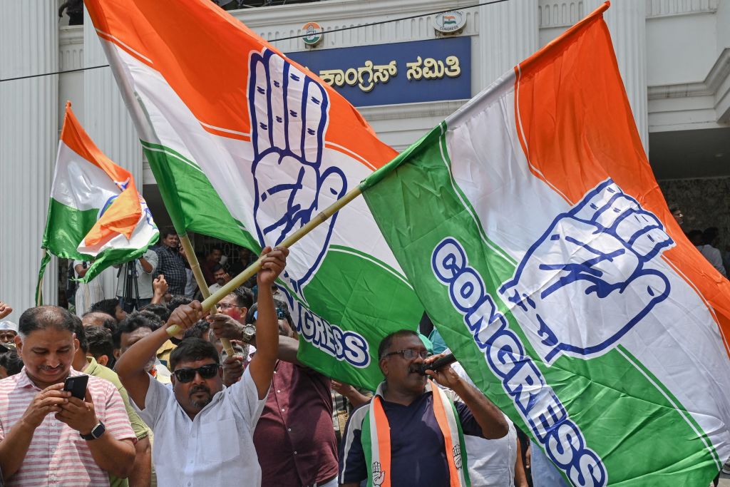 Congress supporters celebrate the party's victory in the Karnataka state legislative assembly election in Bengaluru on May 13, 2023. (Manjunath Kiran—AFP/Getty Images)