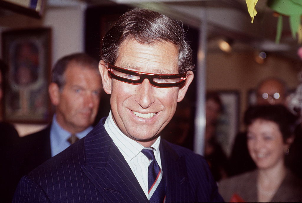 Then-Prince Charles sporting a pair of glasses at the Prince's Youth Business Trust Trade Fair in 1994. (Tim Graham—Getty)