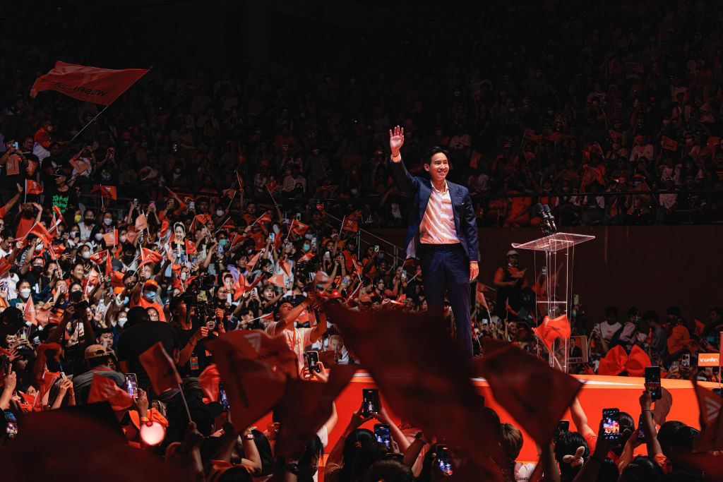 Pita Limjaroenrat, Prime Minister candidate and leader of the Move Forward Party, waves to supporters at a stadium in Bangkok, May 12, 2023. (Varuth Pongsapipatt - SOPA Images/LightRocket/Getty Images)