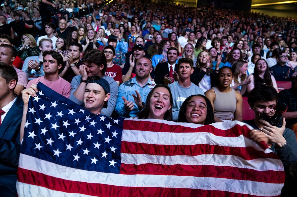 Students cheer during an address by Florida Gov. Ron DeSantis during a convocation at Liberty University's Vines Center in Lynchburg, Va., on April 14, 2023.