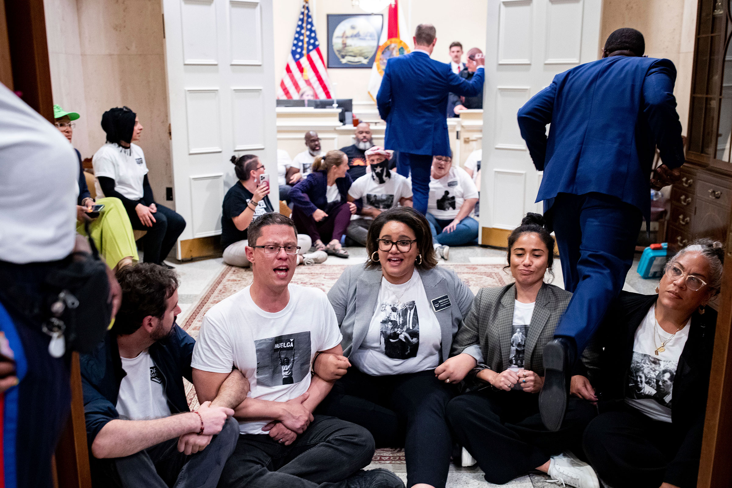 Activists stage a sit-in outside DeSantis' office as they speak out against the governor and his policies on May 3