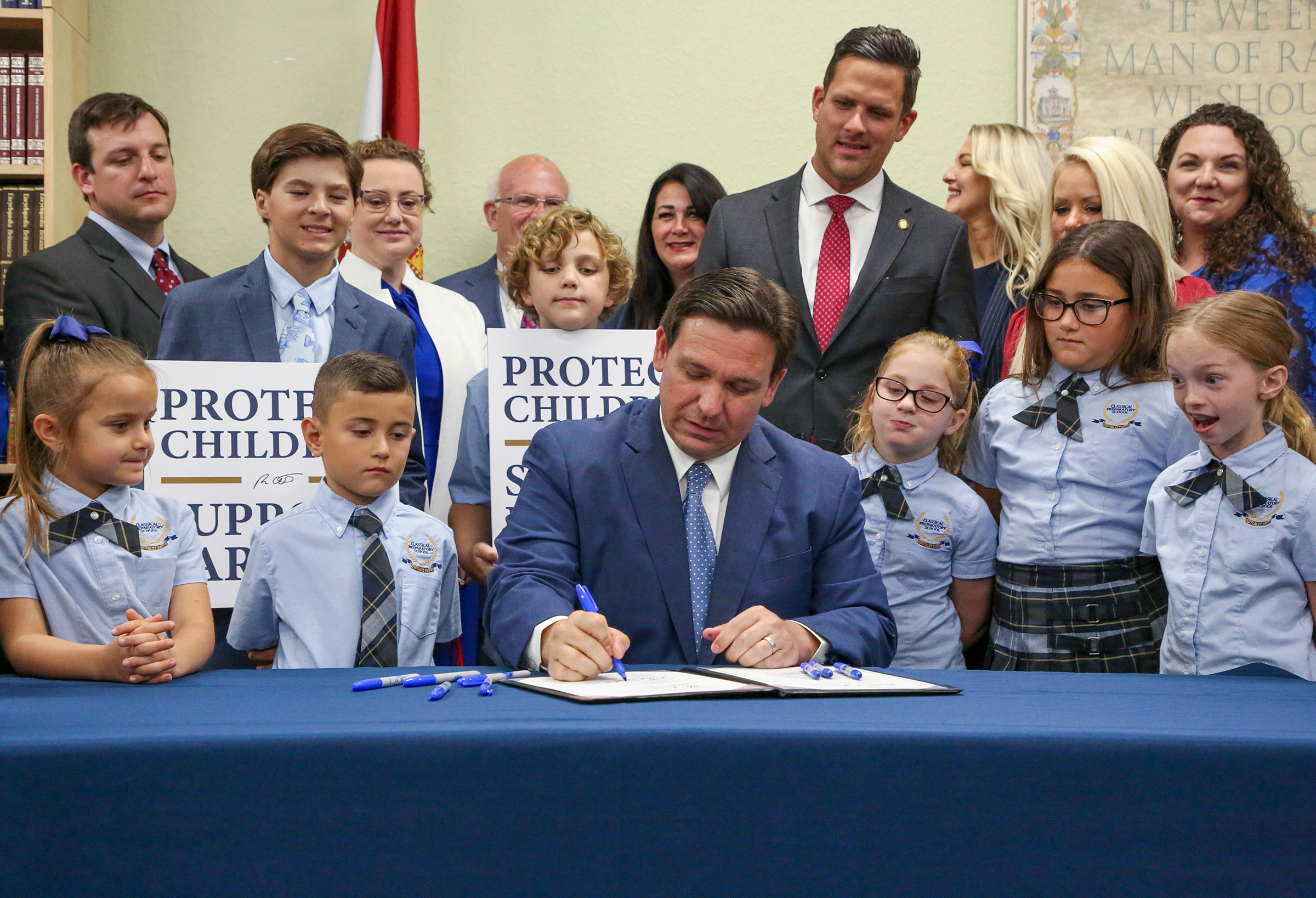 DeSantis signs the Parental Rights in Education bill at Classical Preparatory school on March 28, 2022.