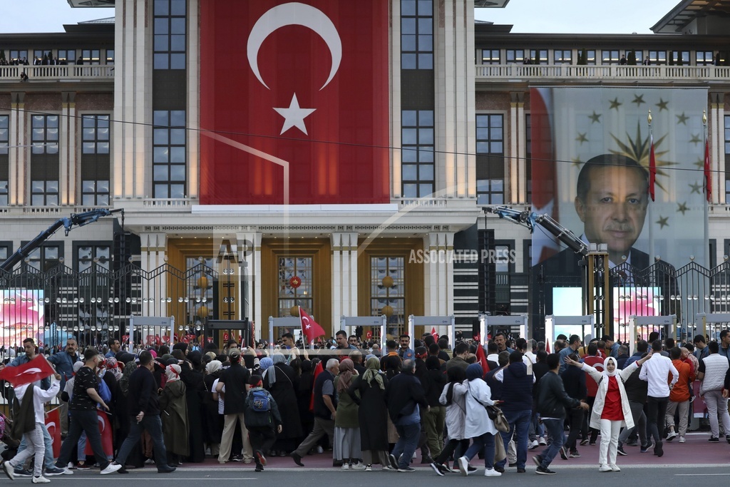 Supporters of the President Recep Tayyip Erdogan gather outside the Presidential Palace in Ankara, Turkey, on May 28, 2023. (Ali Unal—AP)