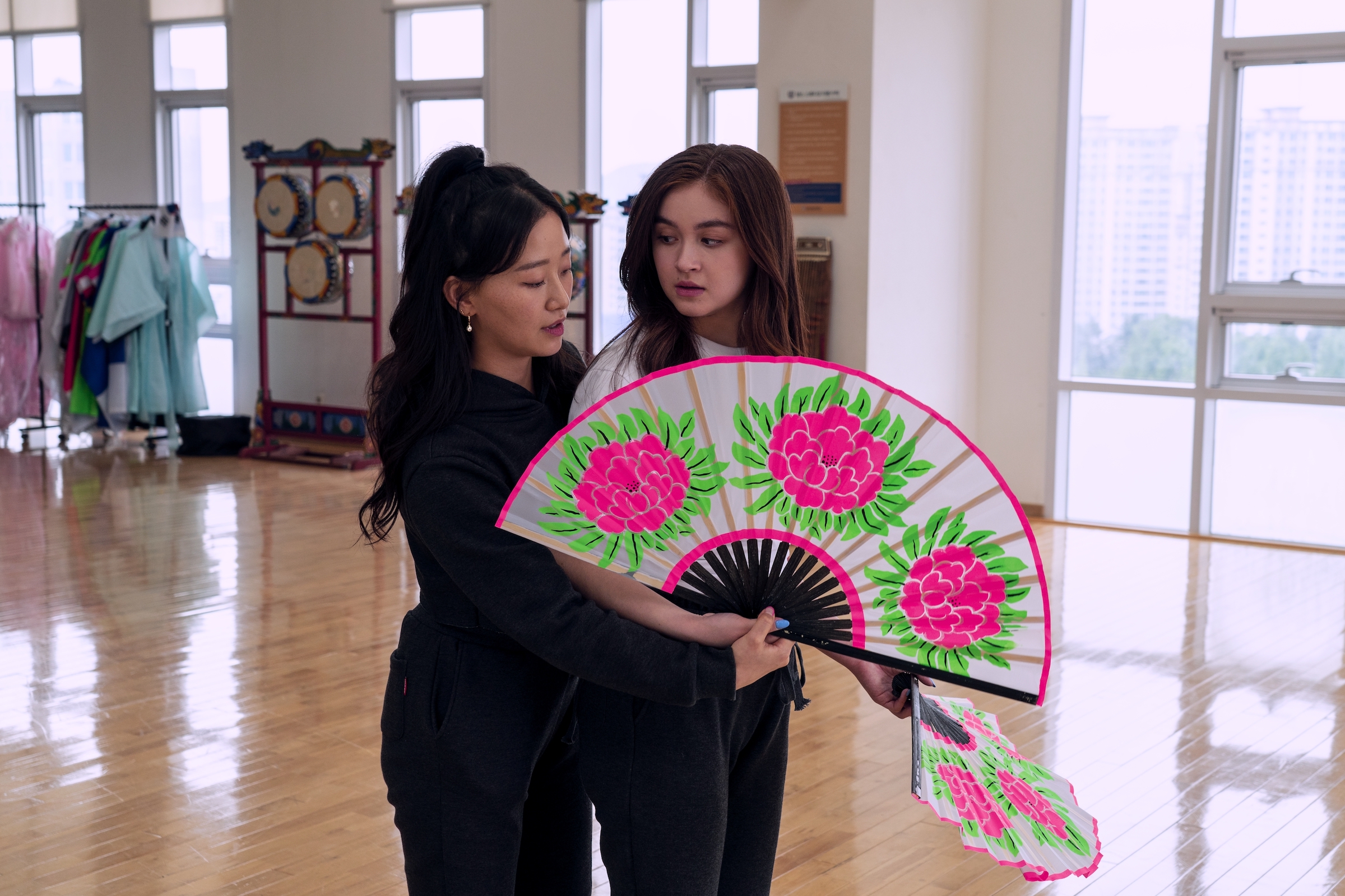 Kitty (Anna Cathcart) has a moment of bi panic as Yuri (Gia Kim) teaches her a dance routine. (Park Young-Sol—Netflix)