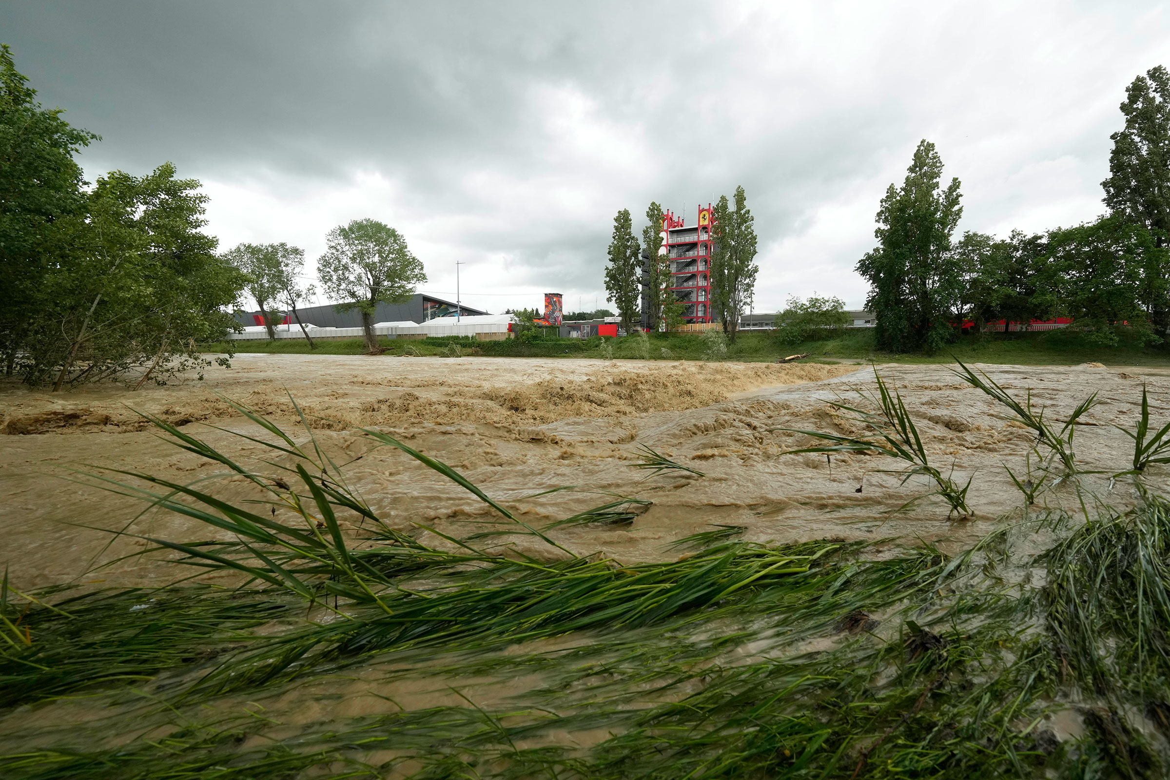 A view of the swollen Santerno River behind the Enzo e Dino Ferrari circuit, in Imola, Italy, on May 17, 2023. (Luca Bruno—AP)