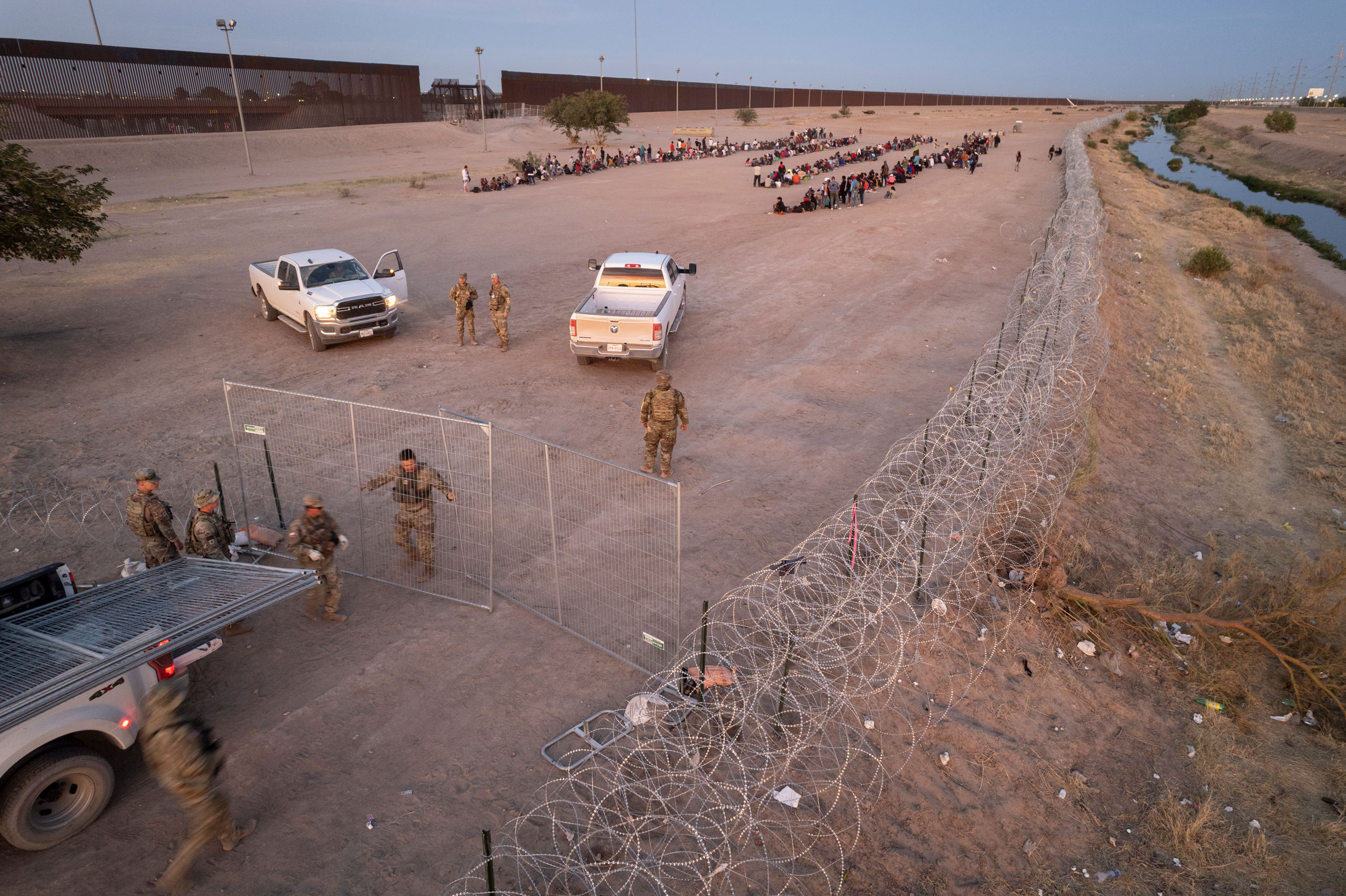 As seen from an aerial view, Texas National Guard troops set up a “choke point” near hundreds of immigrants who had crossed into the United States from Mexico on May 9, 2023. (John Moore—Getty Images)