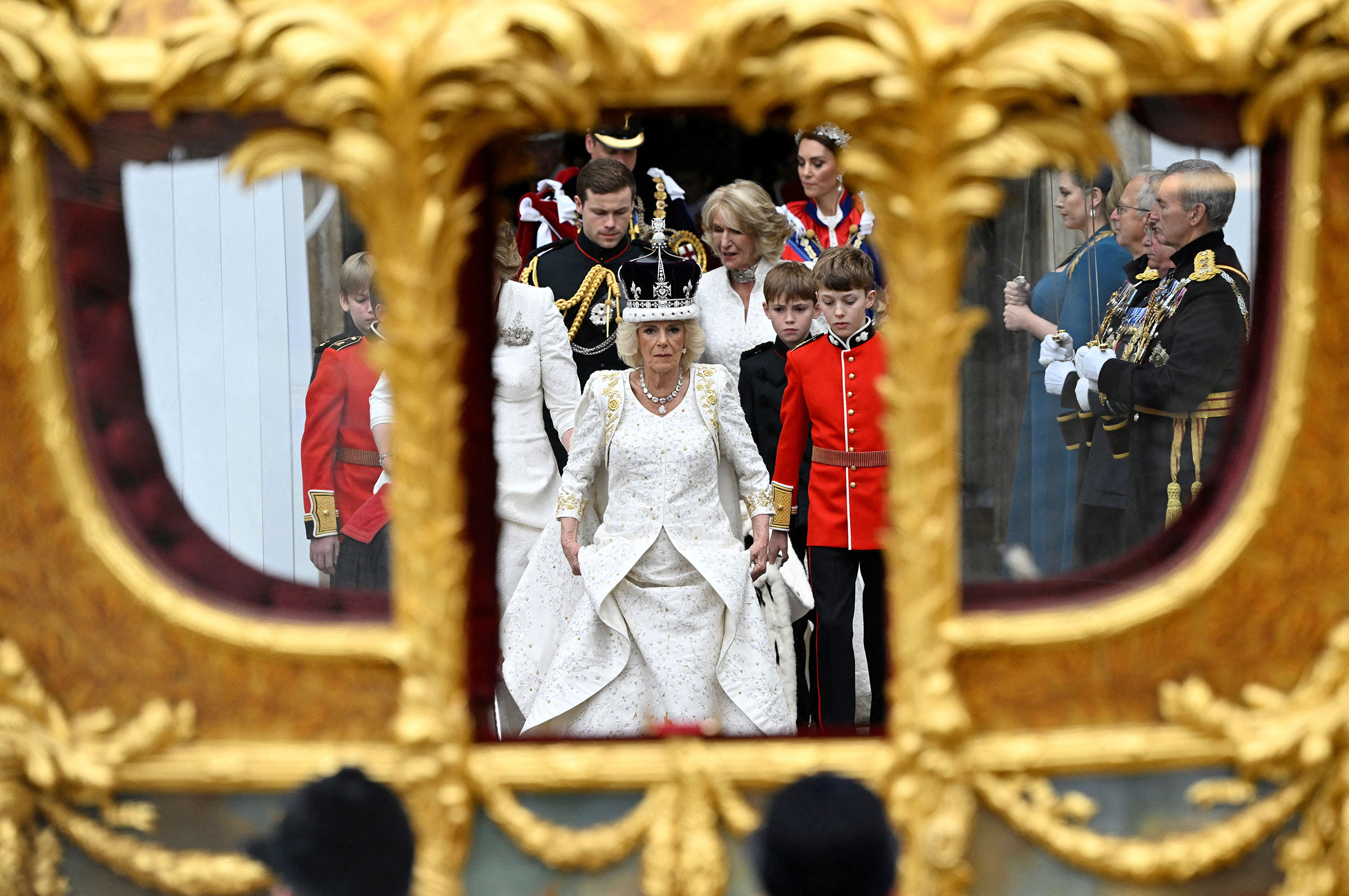 Britain's Queen Camilla, wearing a modified version of Queen Mary's Crown leaves Westminster Abbey after the Coronation Ceremonies. (Toby Melville—POOL/AFP/Getty Images)