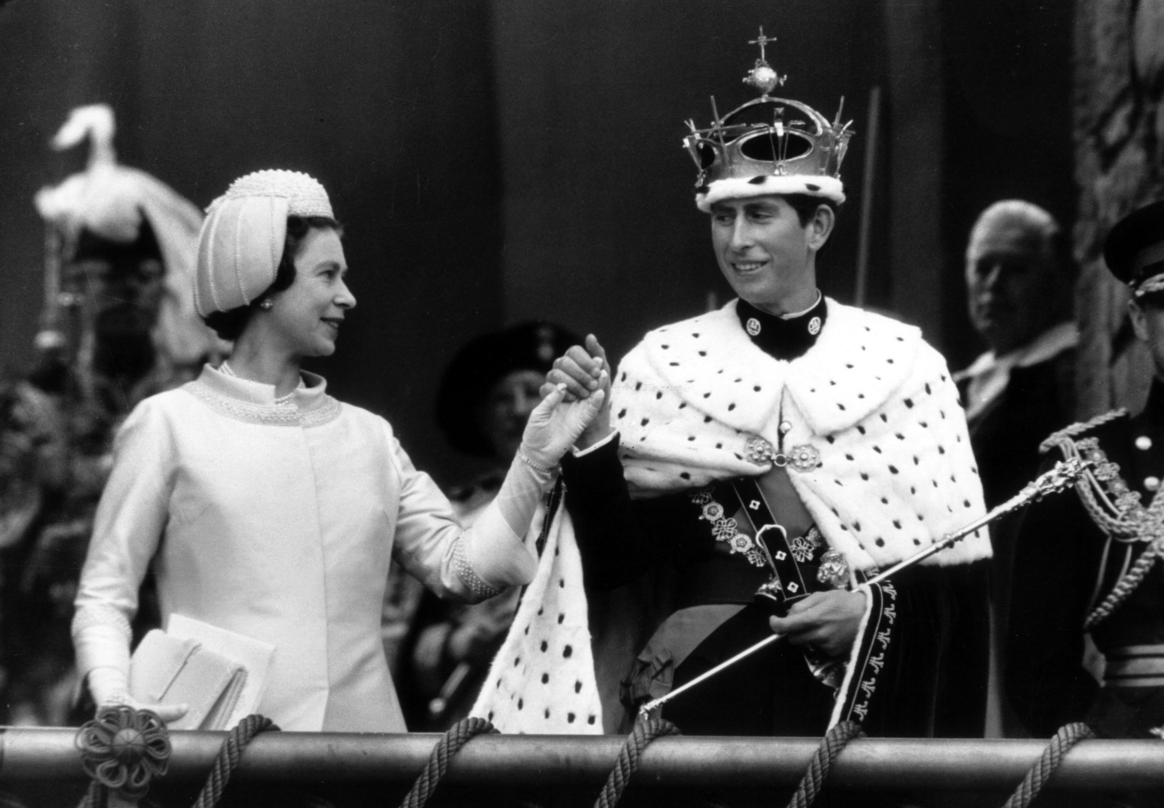 Queen Elizabeth II with her son Charles during his investiture as Prince of Wales on July 1, 1969 in Caernarvon, Wales. (Arthur Sidey—Daily Mirror/Mirrorpix/Getty Images)