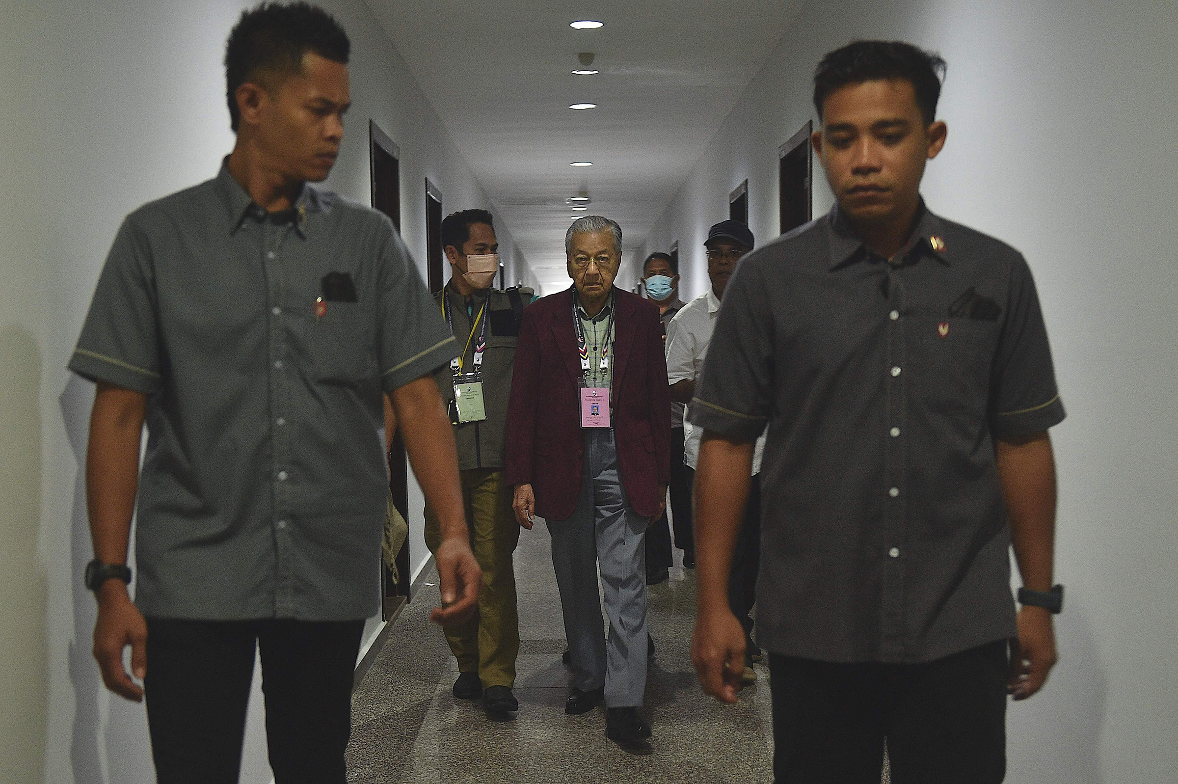 Malaysia's former prime minister Mahathir Mohamad, chairman of Gerakan Tanah Air (Homeland Movement) party, walks toward the nomination center in Langkawi Island on Nov. 5, 2022. (Arif Kartono—AFP/Getty Images)