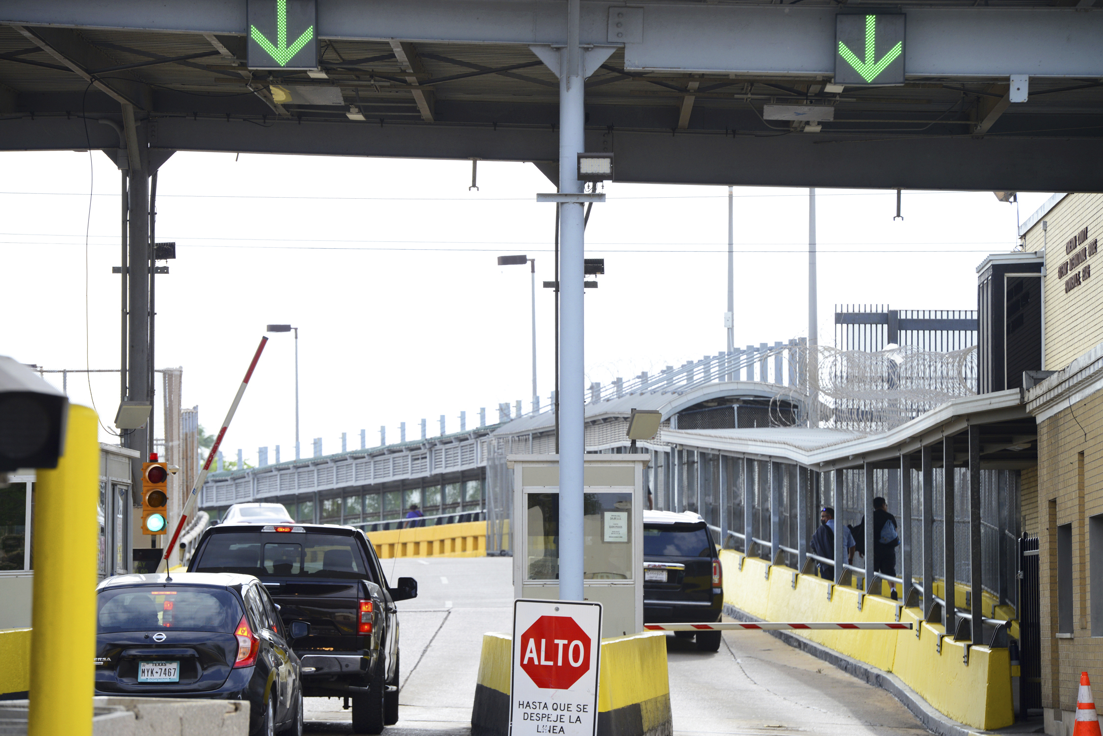 Motorists pay toll at Gateway International Bridge, March 6, 2023, in Brownsville, Texas, to cross into Matamoros, Mexico. (Miguel Roberts/The Brownsville Herald—AP)