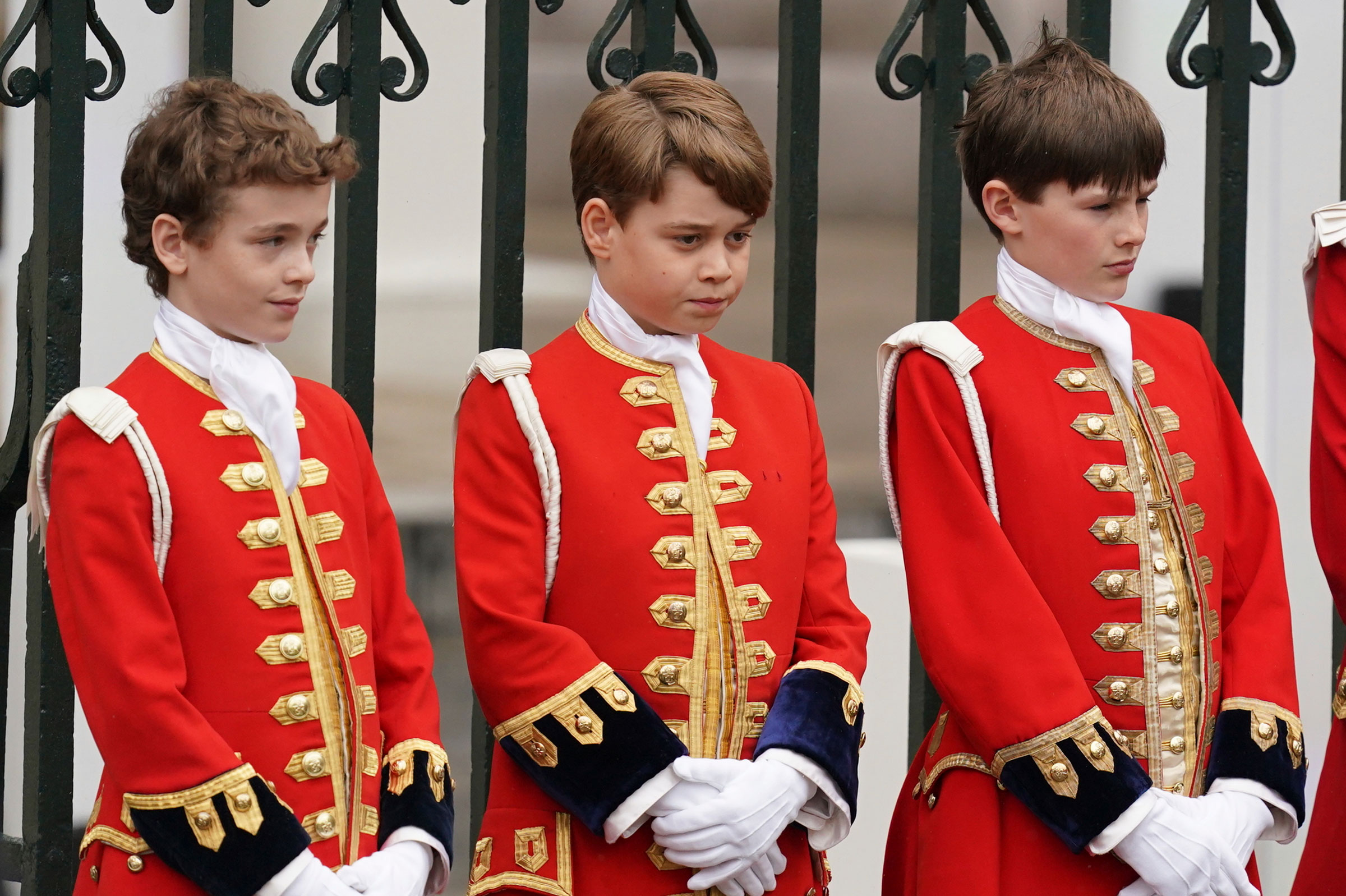 Prince George (middle) as one of four Pages of Honour ahead of the coronation ceremony. (Jacob King—PA Wire/AP)
