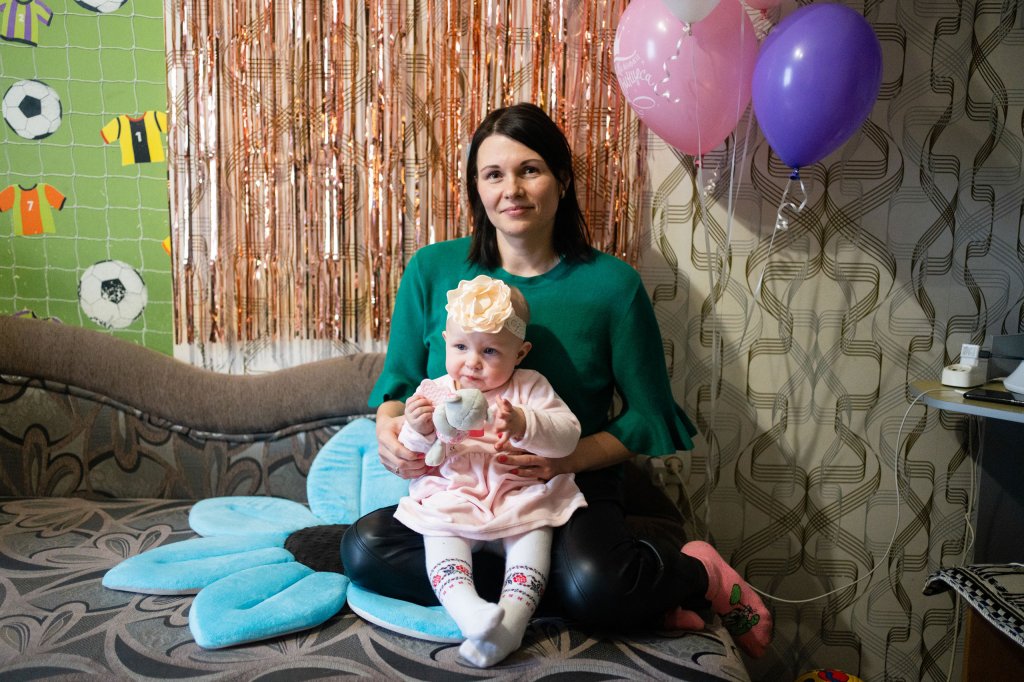 Maryna with her daughter Diana at home in Chernihiv.