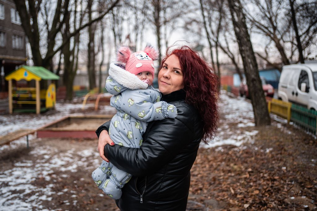 Iryna with her daughter Amelia at a park in Chernihiv.
