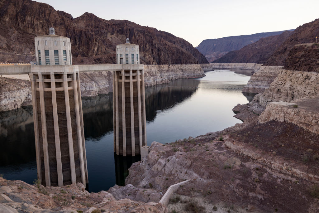 Lake Mead's white ring reveals historic water level decline near Hoover Dam, fed by the Colorado River, on Sept. 16, 2022 in Boulder City, Nevada. On May 22, 2023, Arizona, Nevada, and California, agreed to cut water use as climate change-driven drought continues to lower water levels to historic lows. (David McNew—Getty Images)