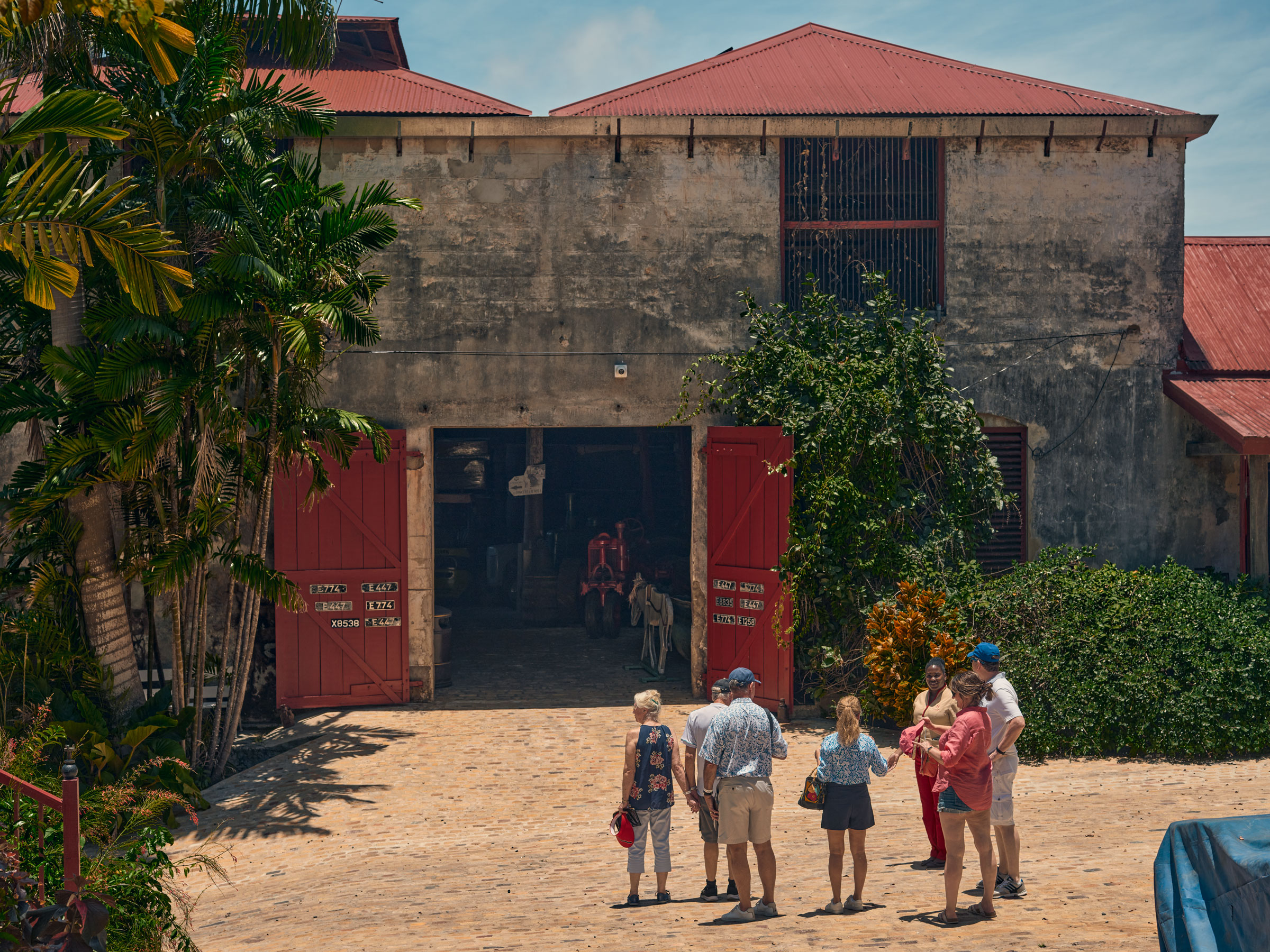 Tourists outside of the St. Nicholas Abbey and Steam Railway in Barbados. (Christopher Gregory-Rivera for TIME)