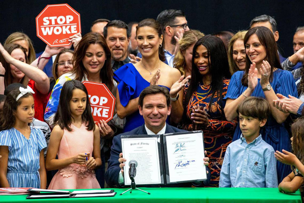 Florida Gov. Ron DeSantis reacts after signing HB 7, the Individual Freedom bill, also dubbed the &quot;Stop Woke Act,&quot; at Mater Academy Charter Middle/High School in Hialeah Gardens, Florida, on April 22, 2022. (Daniel A. Varela-Miami Herald/Tribune News Service)