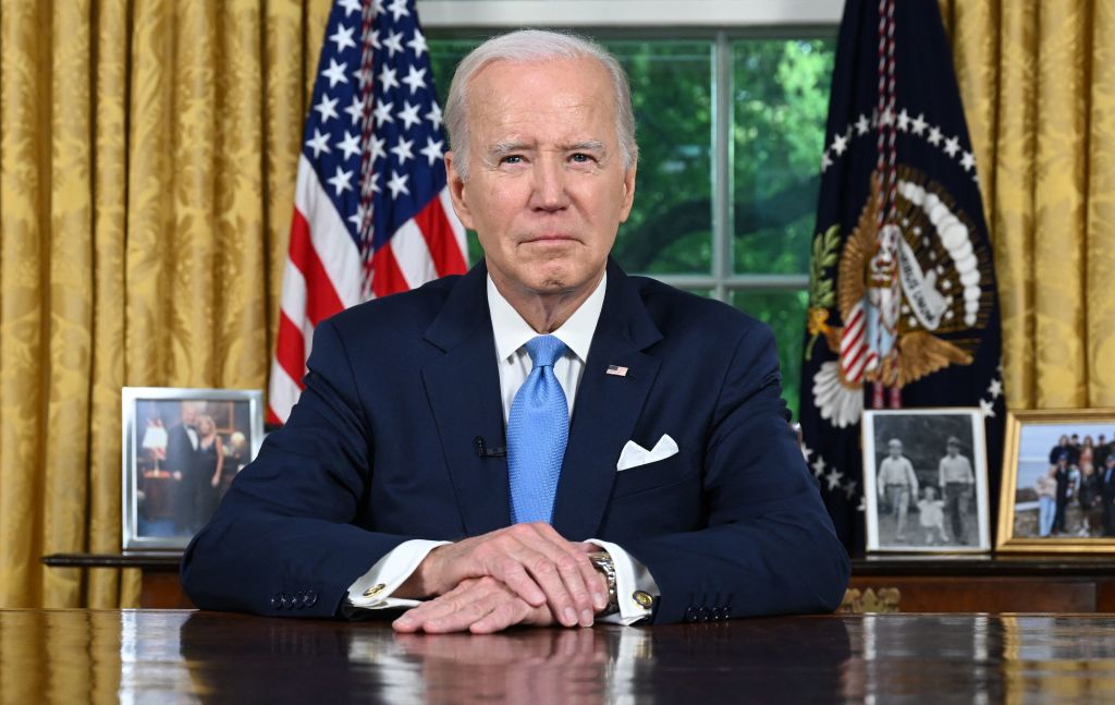 President Joe Biden sits at his desk ahead of addressing the nation on averting default and the Bipartisan Budget Agreement, in the Oval Office of the White House in Washington, DC, on June 2, 2023. (Jim Watson—Pool/AFP via Getty Images)
