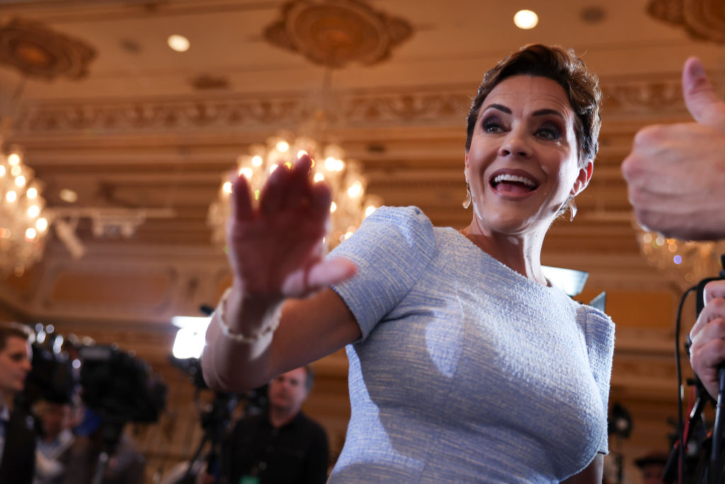Kari Lake, a Republican candidate for Arizona Governor in 2022, greets guests before the start of an event hosted by Donald Trump at Mar-a-Lago on April 4, 2023 in West Palm Beach, Florida (Getty Images&mdash;2023 Getty Images)