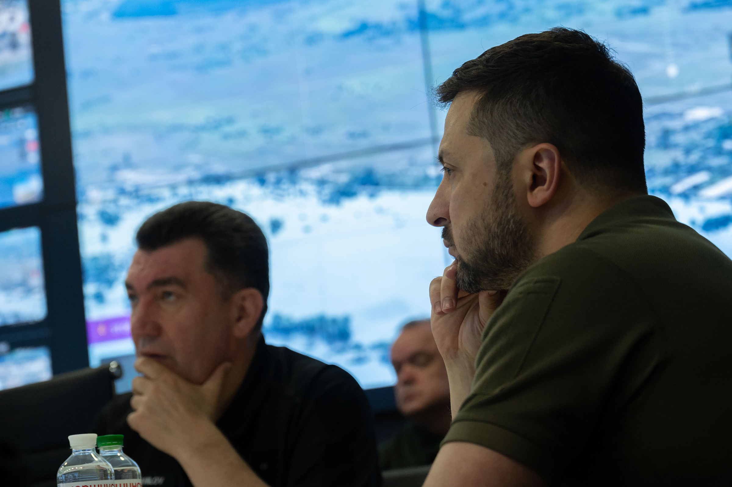 Ukrainian President Volodymyr Zelensky (R) holds an emergency meeting of the National Security and Defense Council on the situation at the Kakhovka after the dam blast overnight, in Kyiv on June 6. (Ukrainian President Press Office/UPI/Shutterstock)
