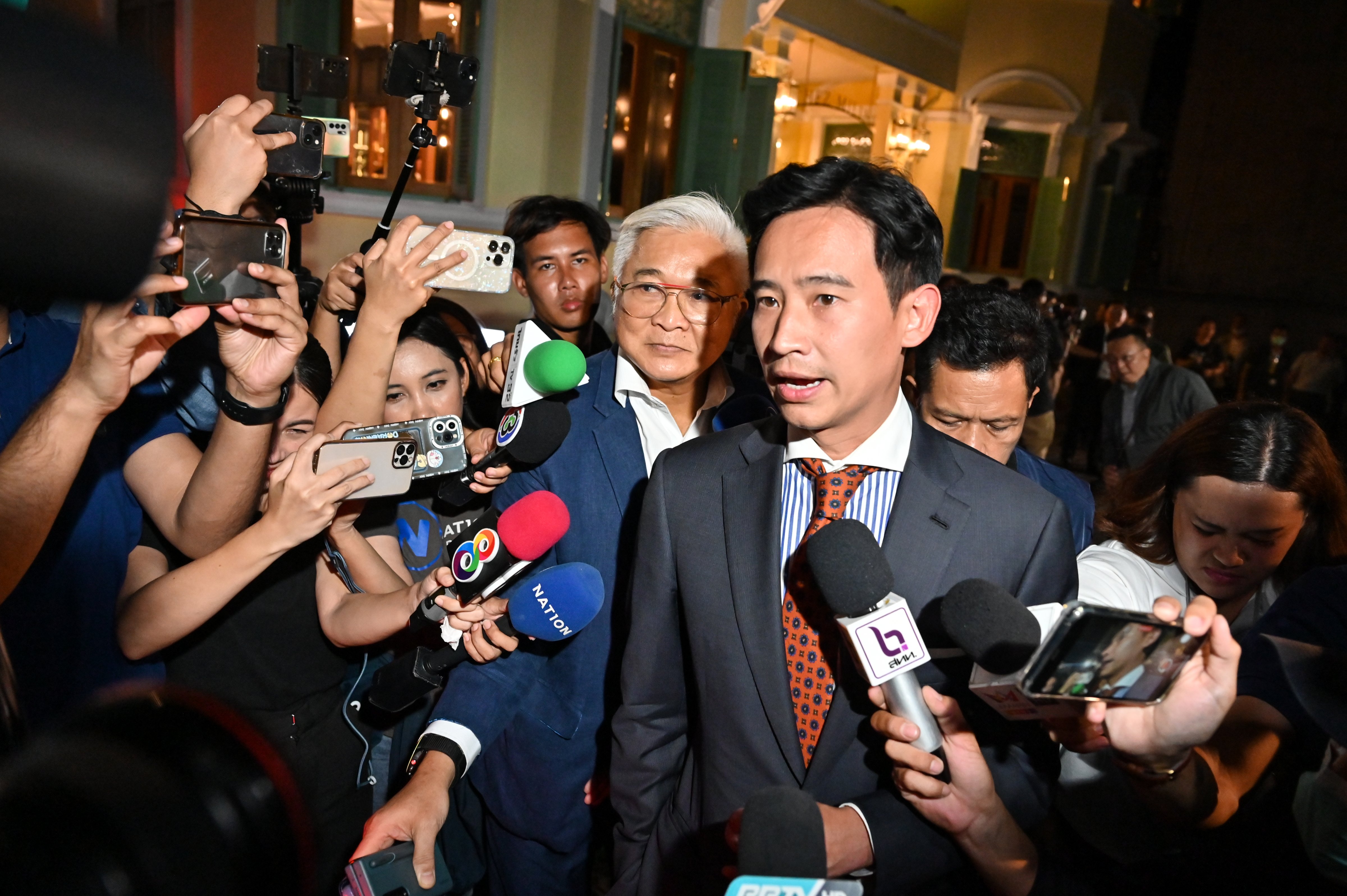 Pita Limjaroenrat, leader of the Move Forward Party, speaks to members of the media following a meeting with coalition partners in Bangkok, Thailand, on Wednesday, May 17, 2023. (James Wilson—Bloomberg/Getty Images)