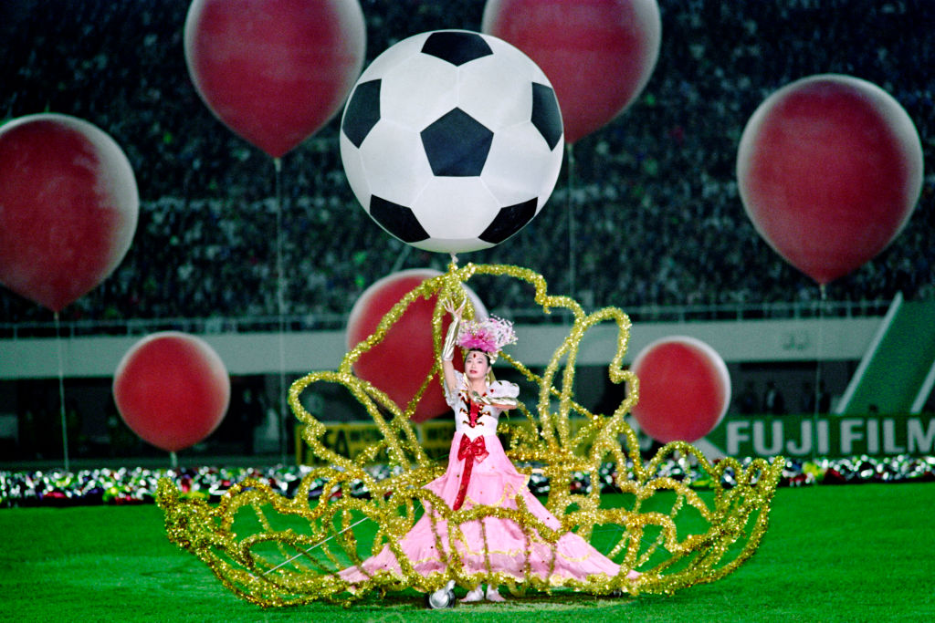 A performer dances during the opening ceremony of what would be the first FIFA Women’s World Cup, in Guangzhou, China, Nov. 16, 1991. (Tommy Cheng—AFP/Getty Images)