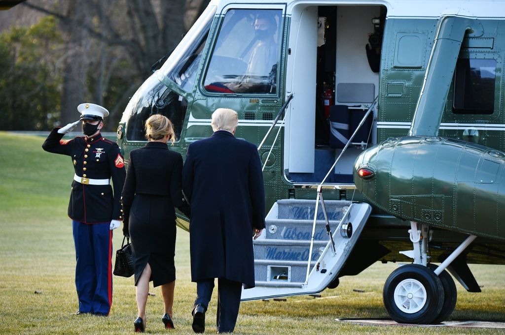 President Donald Trump and First Lady Melania make their way to board Marine One before departing from the South Lawn of the White House in Washington, D.C., on January 20, 2021. (Mandel Ngan—AFP/Getty Images)