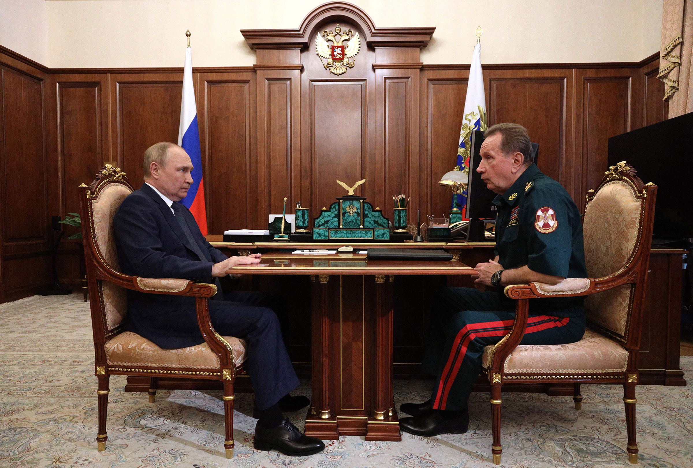 Vladimir Putin speaks with Viktor Zolotov during their meeting in Moscow, on August 30, 2022. (Mikhail Klimentyev—Sputnik/AFP/Getty Images)