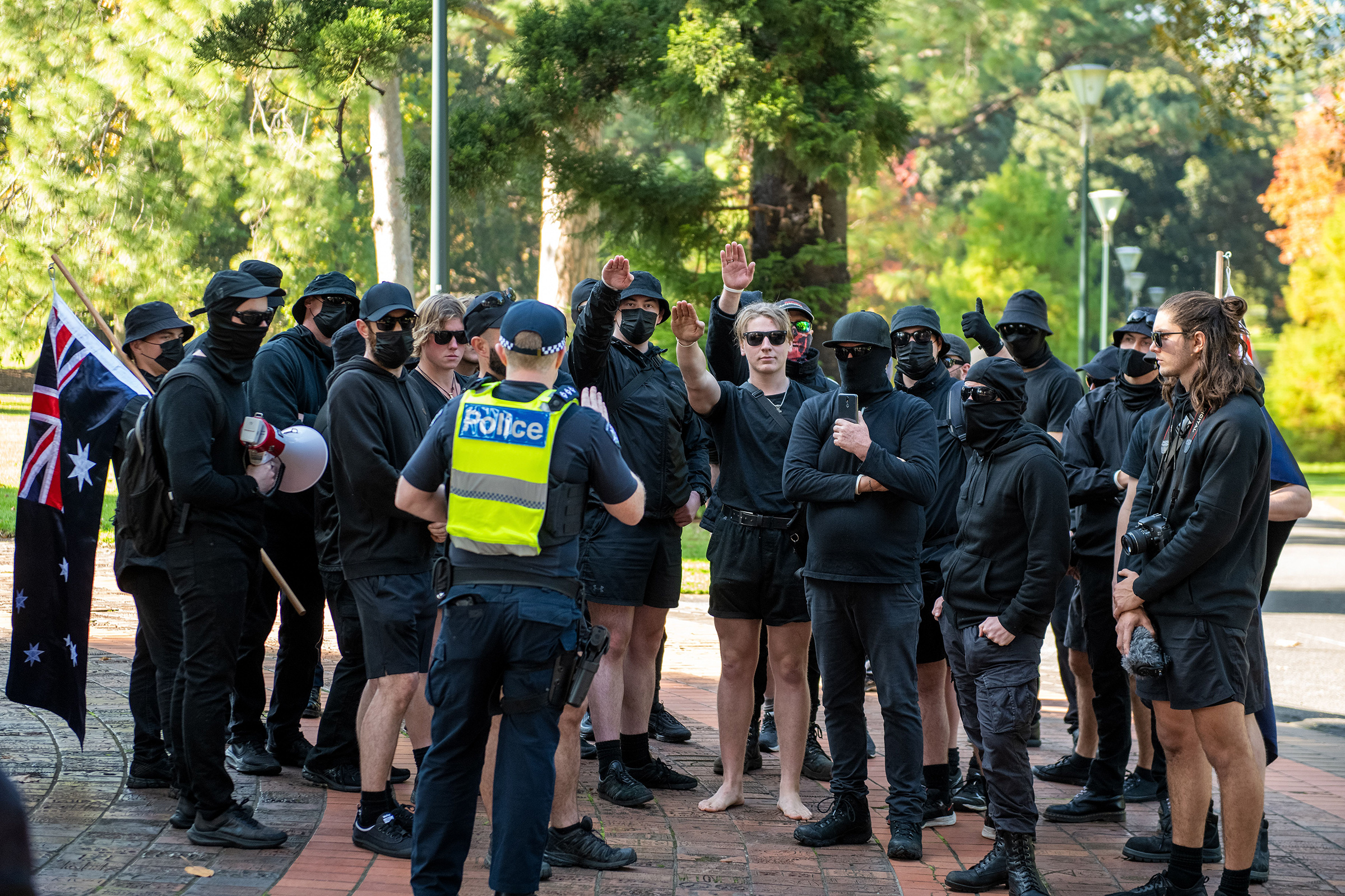 A police inspector tries to order neo-Nazis to leave the area during a heated political rally against racism, as far-right neo-Nazi groups held a demonstration at state parliament, leading to clashes and scuffles on May 13 in Melbourne, Australia.