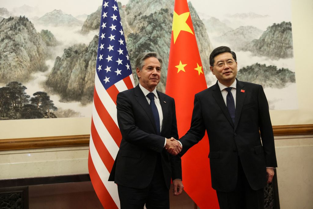 US Secretary of State Antony Blinken (L) and China's Foreign Minister Qin Gang shake hands ahead of a meeting at the Diaoyutai State Guesthouse in Beijing on June 18, 2023.