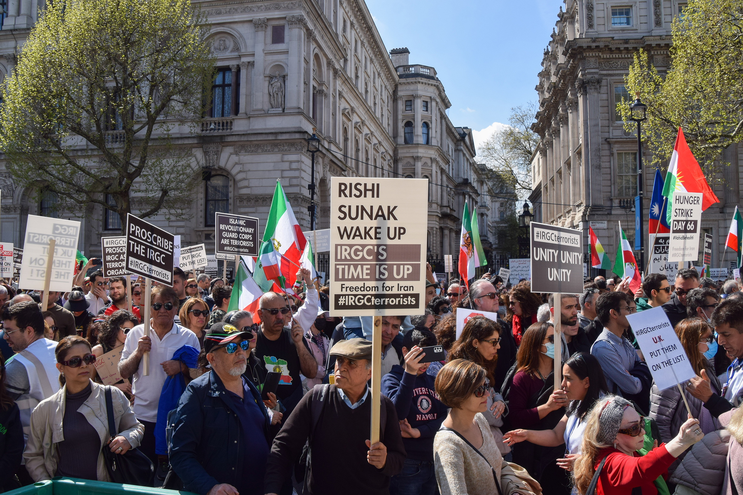 A protester holds a "Rishi Sunak wake up" placard during the demonstration outside Downing Street in London on April 29. Thousands of protesters marched to Downing Street demanding that the UK Government proscribes the Islamic Revolutionary Guard Corps (IRGC) in Iran as a terrorist organisation. (Vuk Valcic—SOPA Images/Shutterstock)