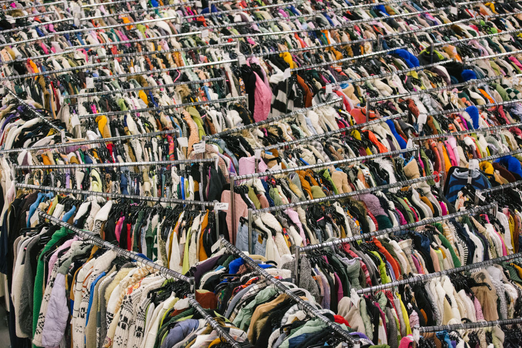 Racks of clothing at the Nuuly warehouse in Levittown, Pa., on Mar. 13, 2023. (Michelle Gustafson/Bloomberg—Getty Images)