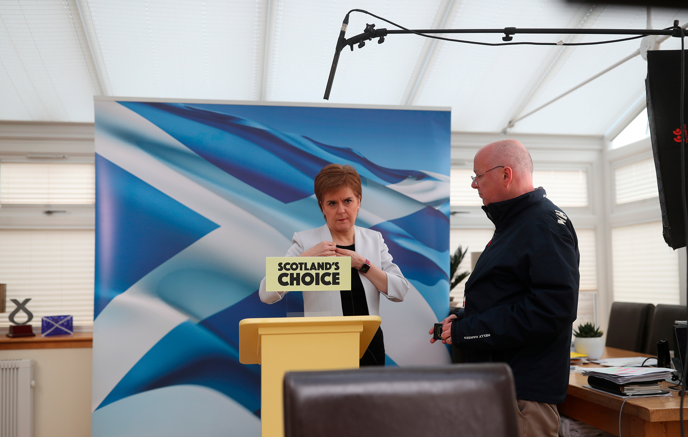 Then First Minister Nicola Sturgeon, with her husband Peter Murrell, rehearses her SNP campaign speech during the Scottish Parliamentary Elections, in Glasgow, Scotland on March 28, 2021. (Russell Cheyne—PA Wire/Press Association/AP Images)
