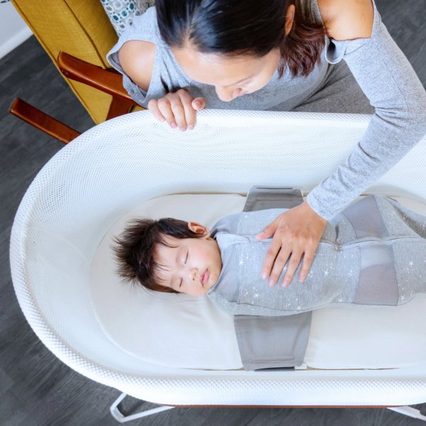 Happiest Baby's SNOO bassinet, which helps babies sleep on their backs.