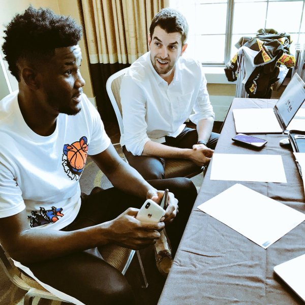 Opendorse CEO Blake Lawrence with basketball player DeAndre Ayton.
                                        Courtesy Opendorse
