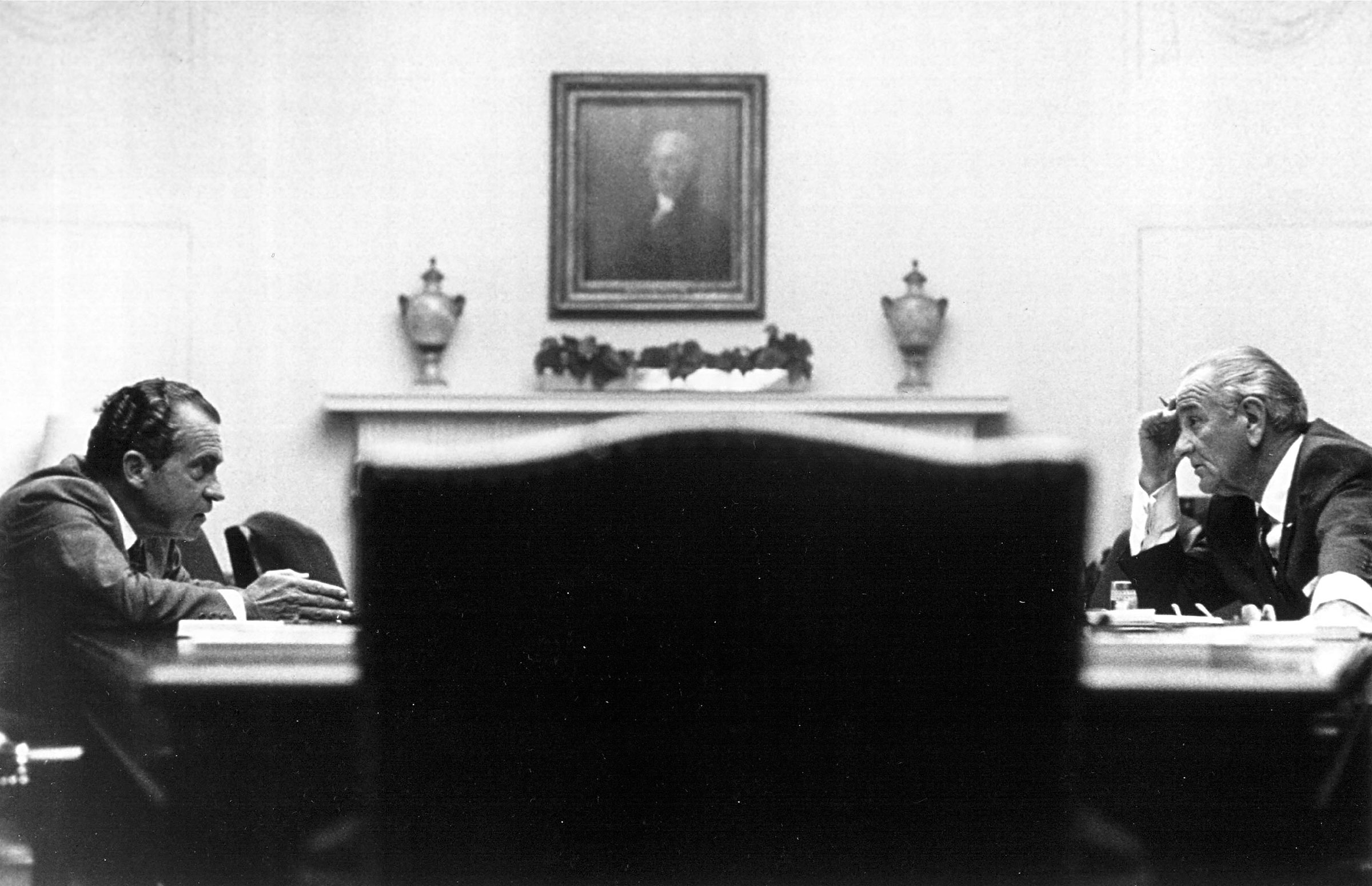 President Lyndon Johnson meets with presidential candidate Richard Nixon in the White House on July 26, 1968. (National Archive/Newsmakers/Getty Images)