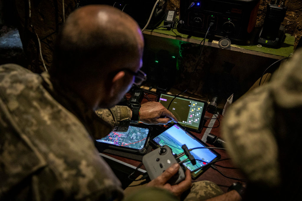 A soldier from the 110th Territorial Defense Brigade seen controlling the drone for surveillance in the basesment at an undisclosed position in Novodarivka, Zaporizhzhia Oblast. Ukraine is undergoing the counter-offensive in the east and the south, taking villages by villages under mounting casualties amid heavy Russian artillery fire and fields of landmines, Ukrainian President Volodymyr Zelenskyy said earlier in an interview that the counter-offensive is not going as planned, blaming the Western nations for not supplying weapons and supplies on time. (Alex Chan Tsz Yuk-SOPA Images/LightRocket)