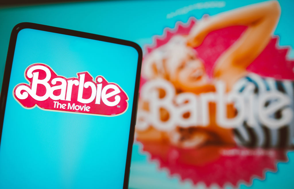 In this photo illustration, the Barbie the movie logo seen