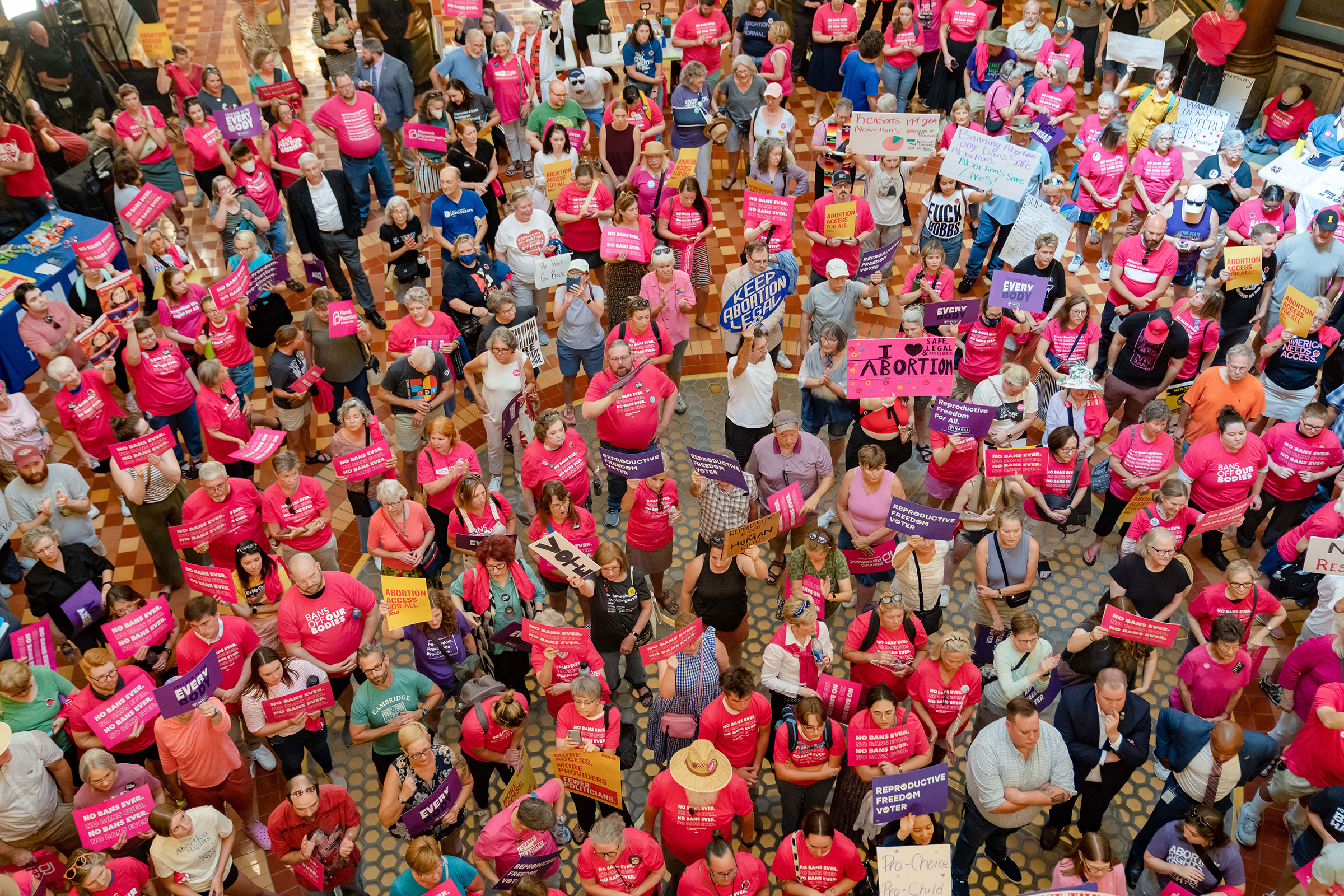Protestors hold a rally for reproductive rights in the Iowa State Capitol rotunda as the Iowa Legislature convenes for special