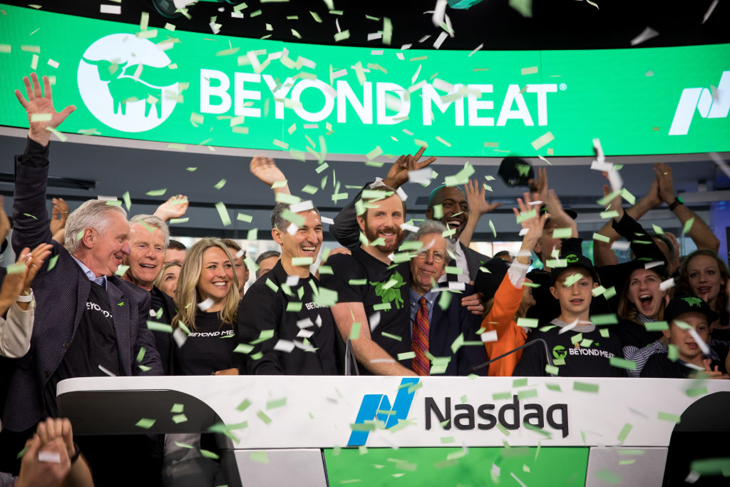 Ethan Brown, founder and chief executive officer of Beyond Meat Inc., center, rings the opening bell during the company's initial public offering (IPO) at the Nasdaq MarketSite in New York, U.S., on May 2, 2019. (Michael Nagle/Bloomberg—Getty Images)
