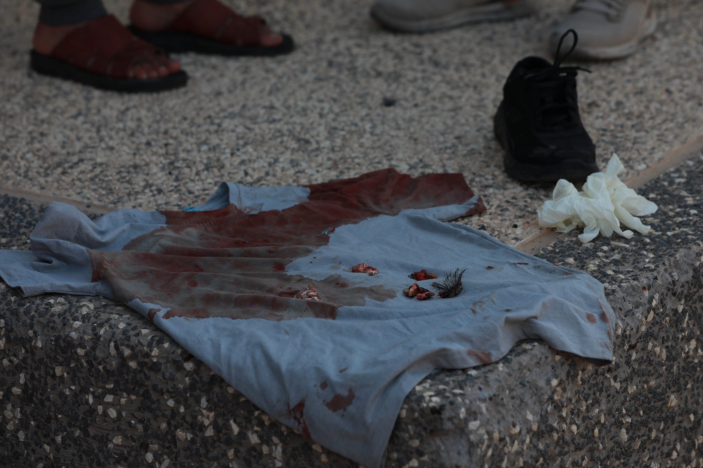 A bloodied shirt can be seen at a scene where 3 Palestinian were killed during a clash with Israeli forces near Mount Al-Tur in the West Bank city of Nablus, on July 25.