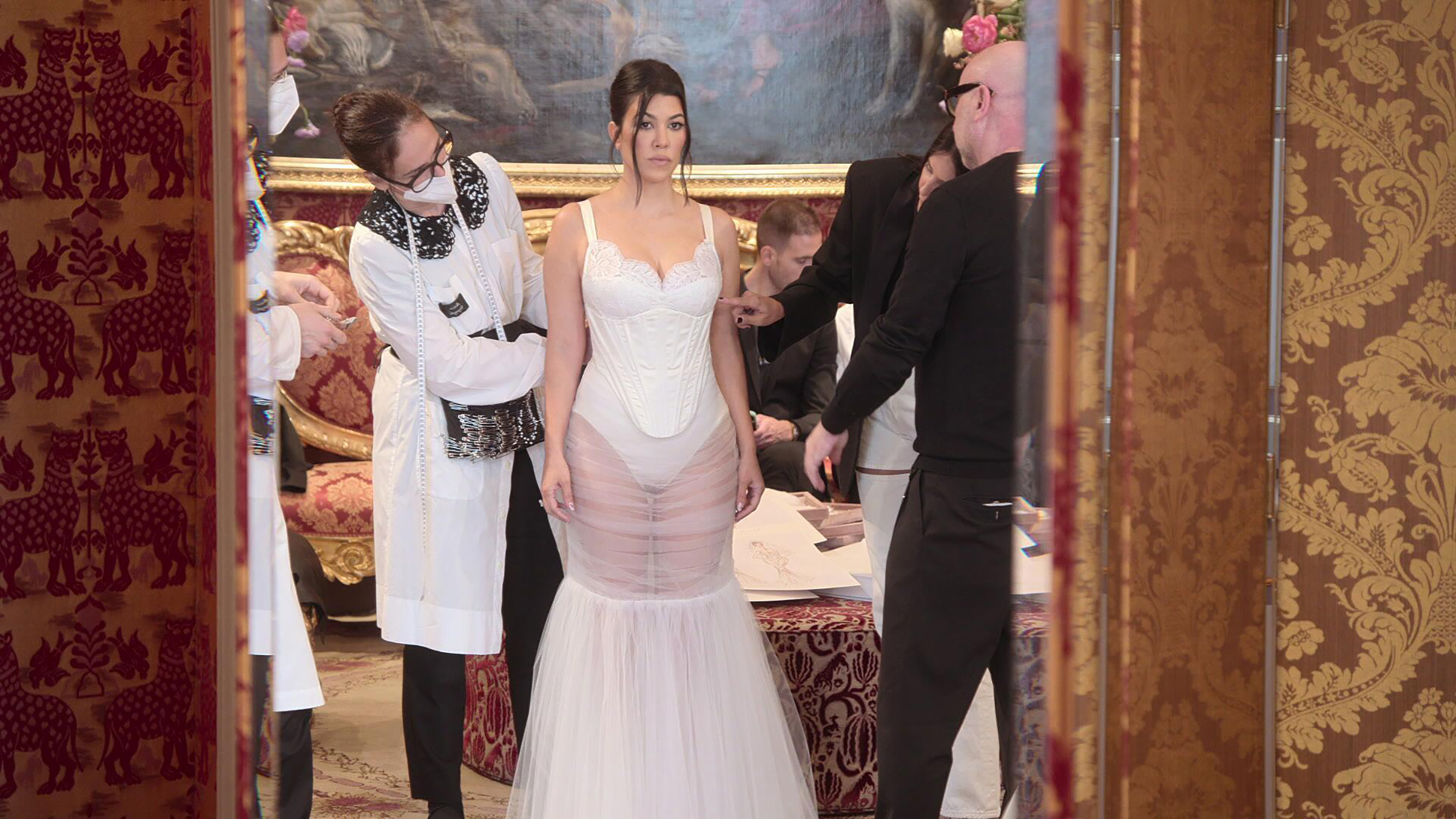 Kourtney Kardashian sees her wedding dress for the first time in Milan. (Hulu)