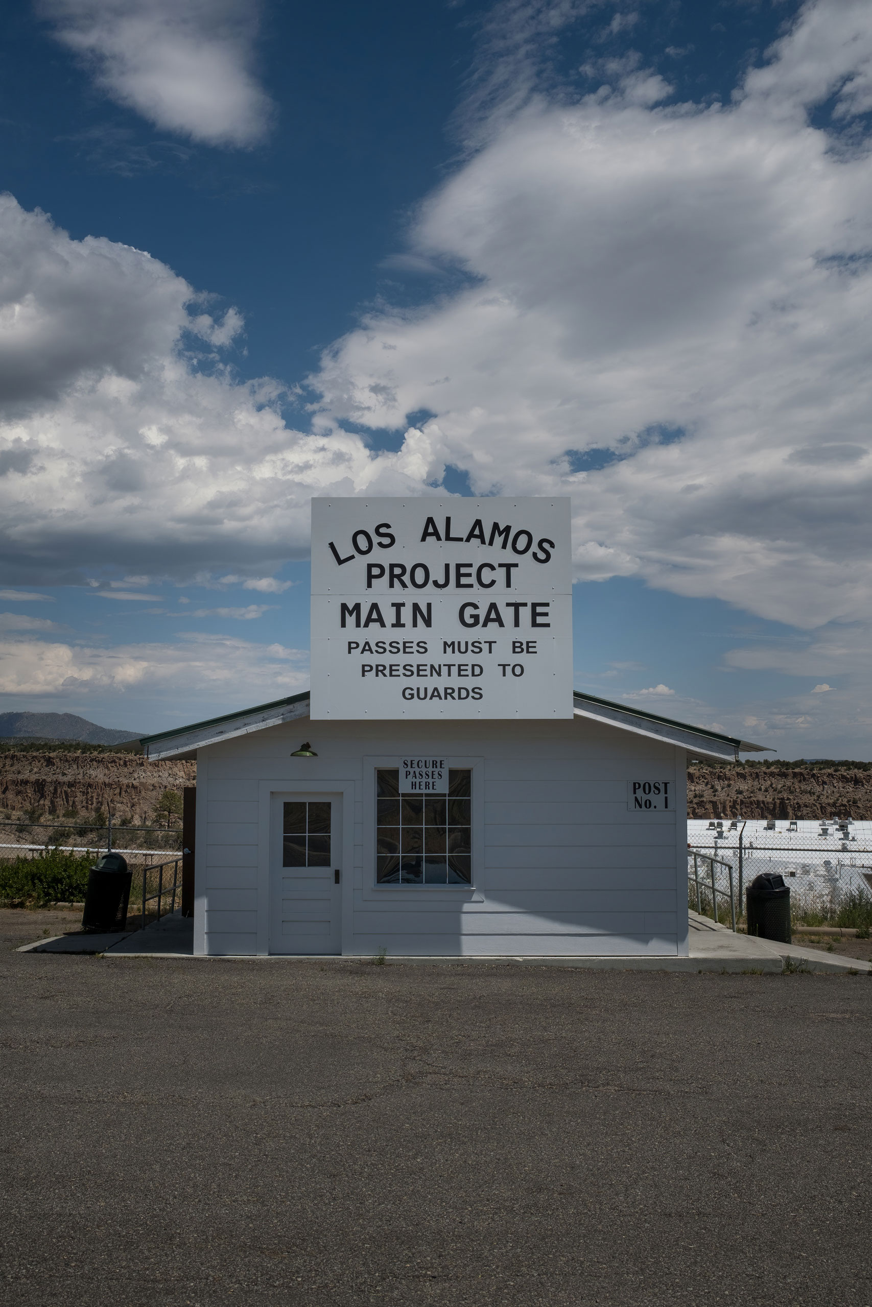 recreation of the historic security gate reading “Los Alamos Project Main Gate”