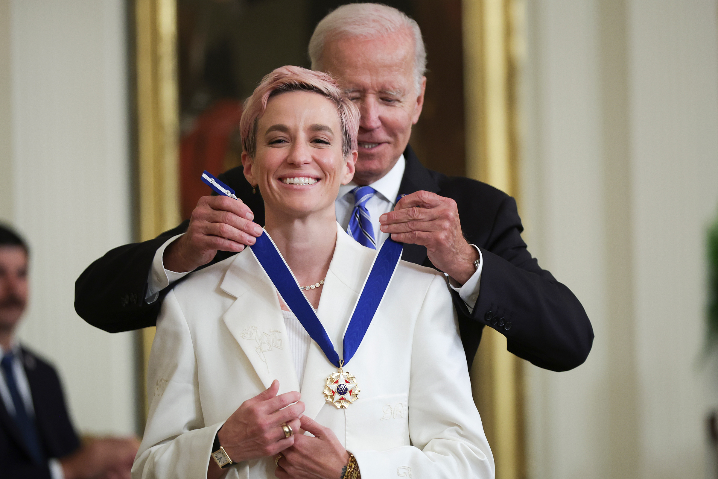 Megan Rapinoe receiving the medal of freedom from President biden
