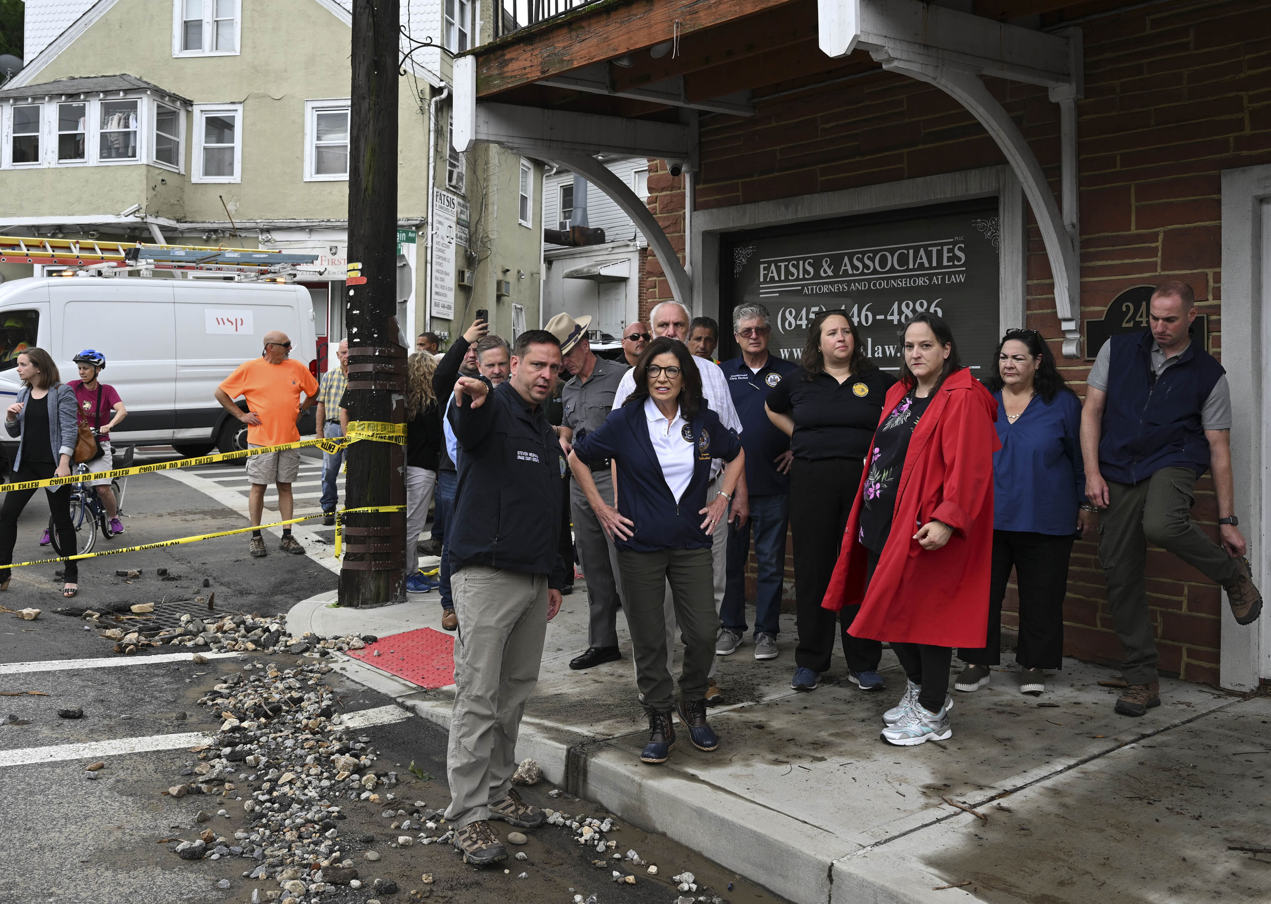 Governor Kathy Hochul surveys the damage in a visit to update residents on the state’s efforts to respond to Sunday’s flooding that devastated the area in Highland Falls, N.Y., on July 10. (Fatih Aktas—Anadolu Agency/Getty Images)