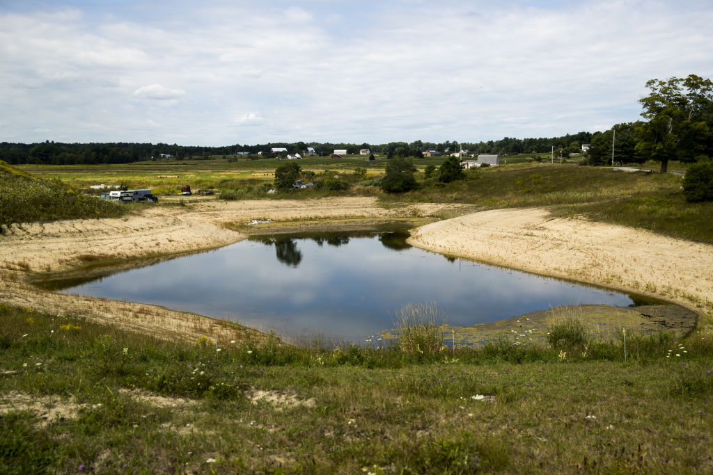 Water sits at the Stoneridge Farm in Arundel, Maine, U.S., on Aug. 15, 2019. State and federal regulators and researchers have only recently begun to study PFAS chemicals in agriculture. The Stoneridge Farm is one of only three in the country known to have been shut down by the presence of PFAS.
