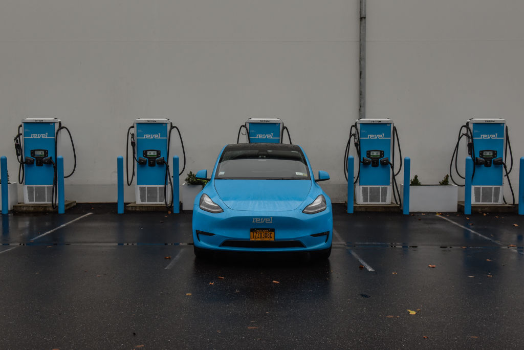An electric vehicle charges at the Revel charging station on Marcy Avenue in the Bedford-Stuyvesant neighborhood in the Brooklyn borough of New York, U.S., on Oct. 24, 2022.  (Stephanie Keith/Bloomberg—Getty Images)