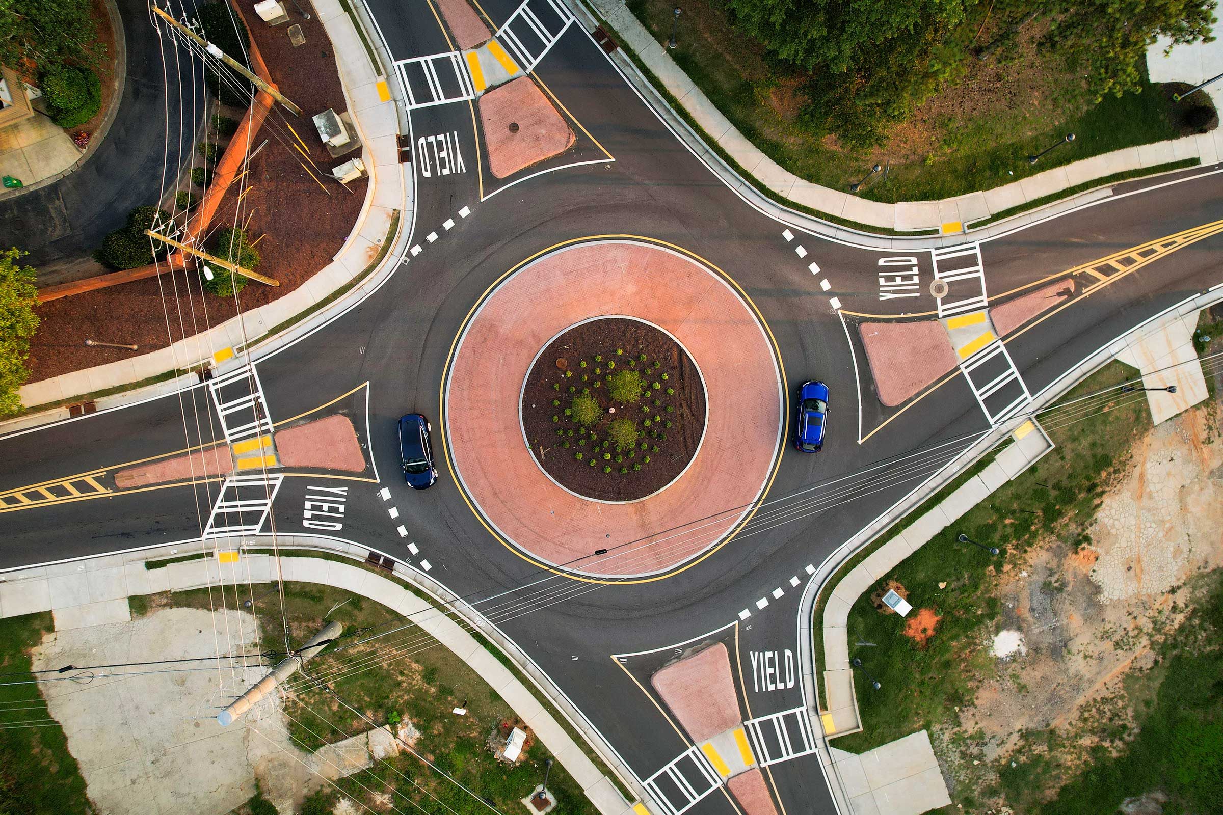 Cars travel through a roundabout in Georgia