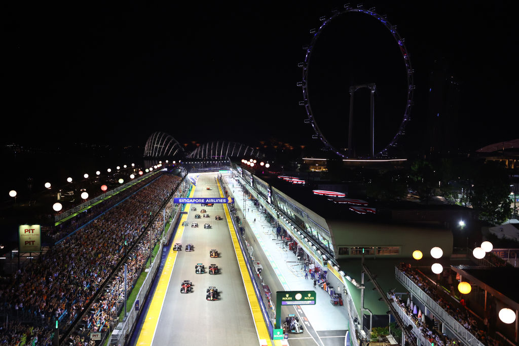 Cars race through the city during the F1 Grand Prix of Singapore at Marina Bay Street Circuit on Oct. 2, 2022. (Bryn Lennon—Formula 1/Getty Images)
